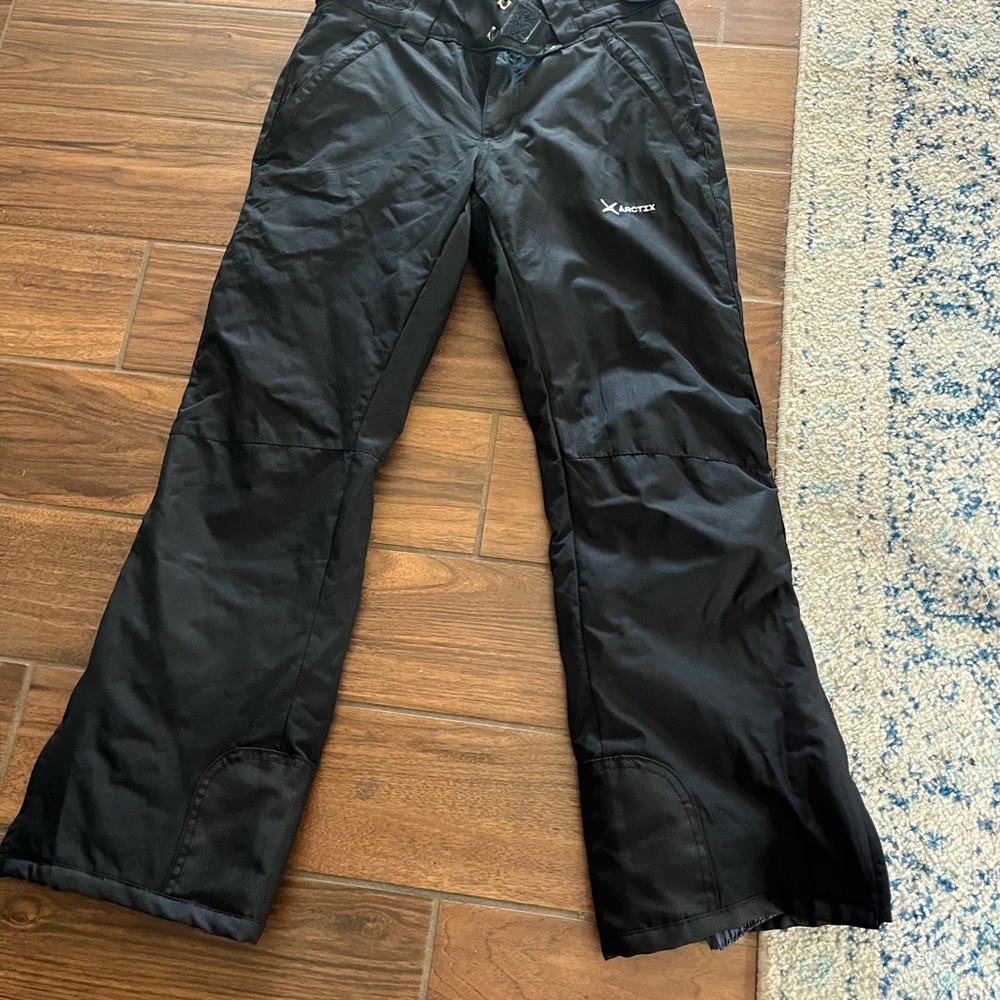 woman’s black snowboard cold weather pants